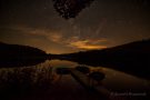 Bootssteg am See in der Nacht